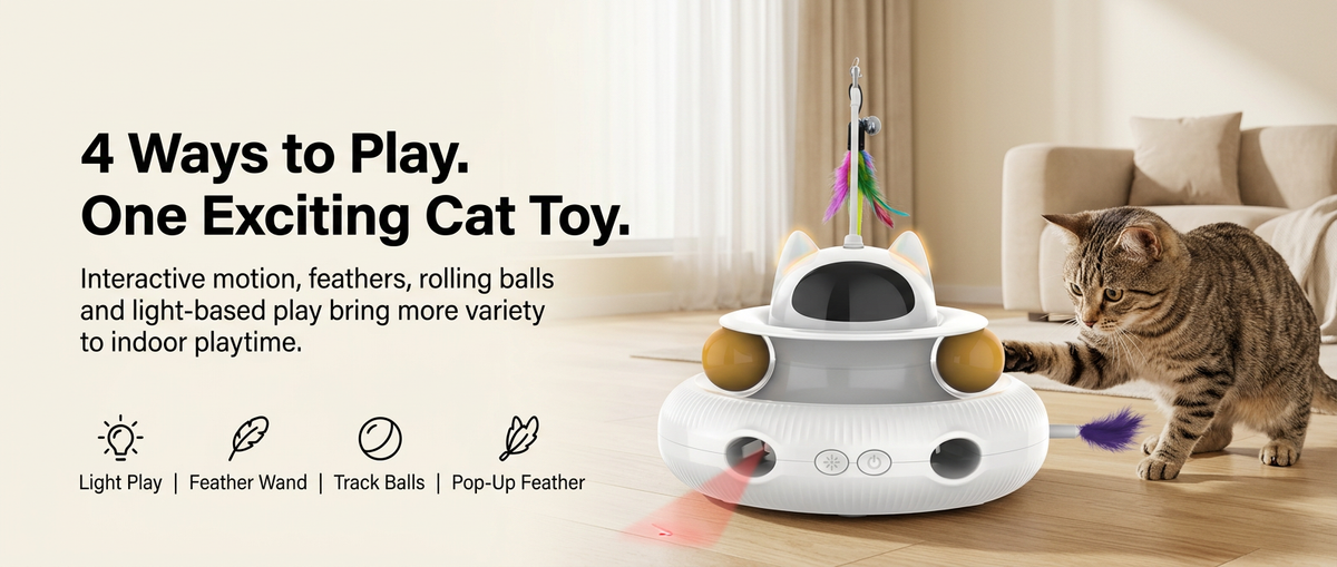  White 4-in-1 automatic interactive cat toy with feather wand, rolling track balls and side feather being explored by an indoor cat