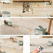 Happy indoor cat playing with a remote-controlled electronic moving toy in a modern home.