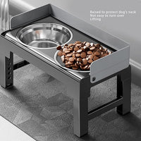 Raised dog feeder with adjustable height and anti-slip base