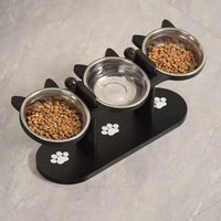 Black cat bowl stand designed for elevated indoor pet feeding