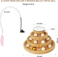 Indoor cat pawing and chasing balls in a wooden track toy