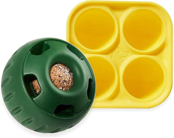 Dog ball toy with treat tray and silicone insert for interactive play