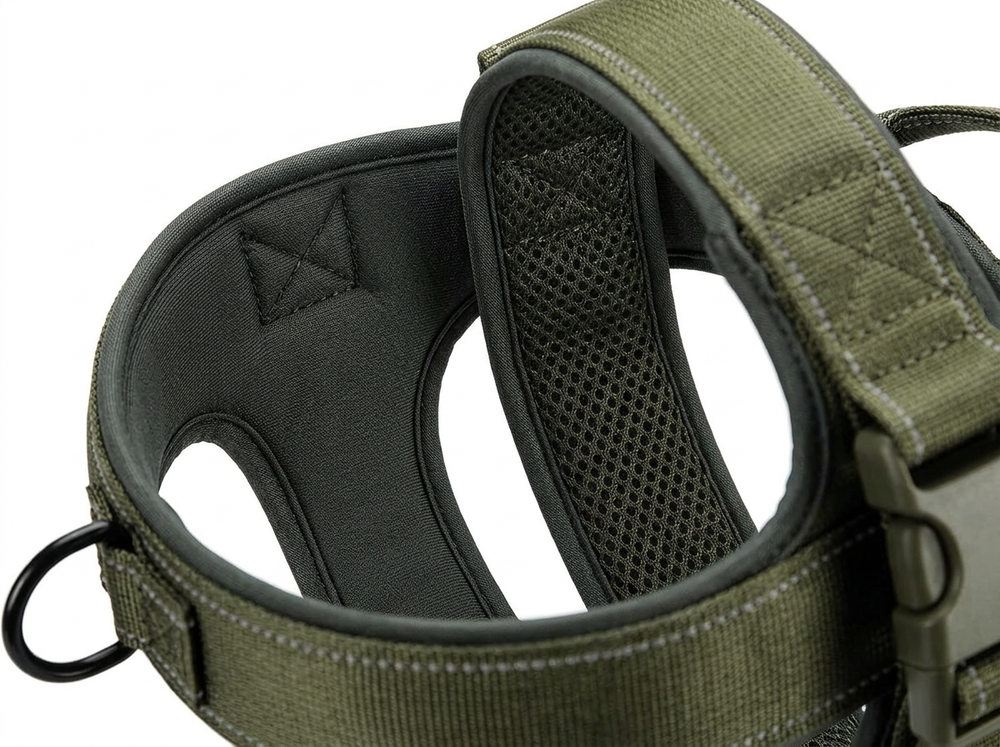 Close up of durable khaki woven nylon straps and reinforced stitching on a dog harness