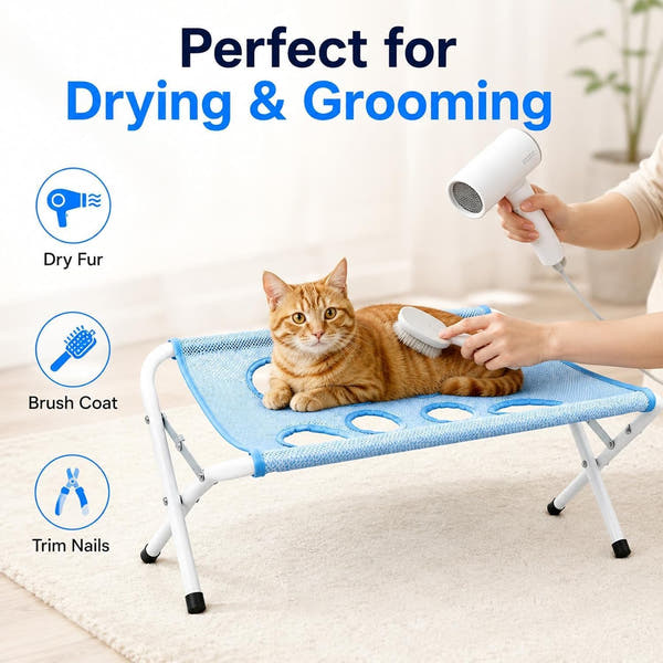 Dog grooming hammock providing paw access for convenient pet nail trimming