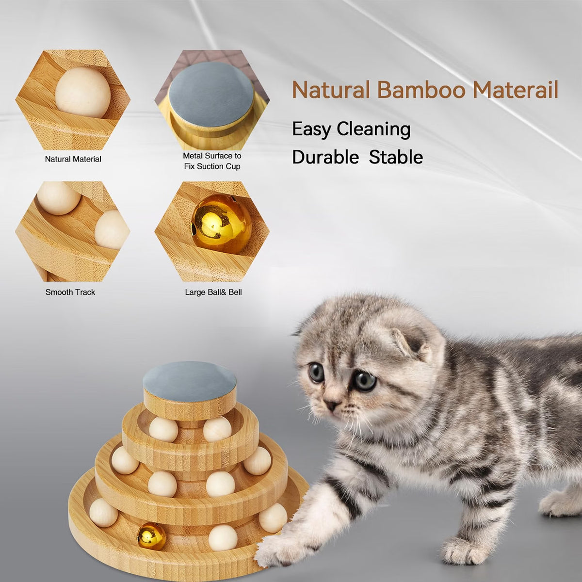 Cat chasing a rolling ball in an interactive wooden toy