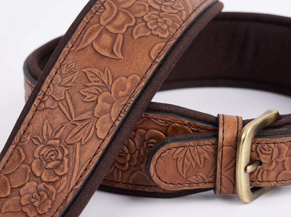 Soft dark brown padded interior of a wide embossed leather dog collar