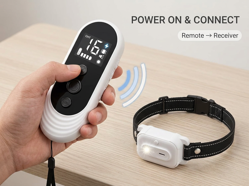 
White dog training remote connecting wirelessly with the matching collar receiver.