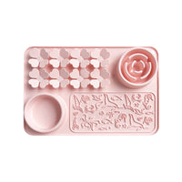 Silicone pet feeding mat with textured sections for treats and wet food