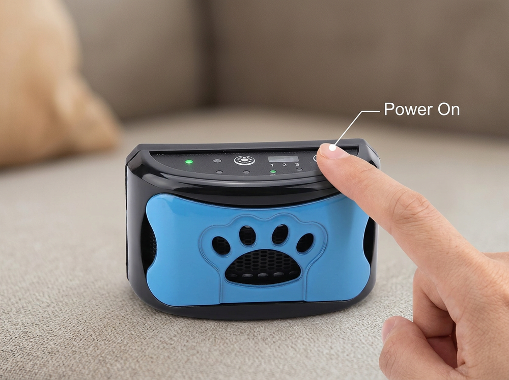Close-up of the power control on a rechargeable blue anti-bark dog collar